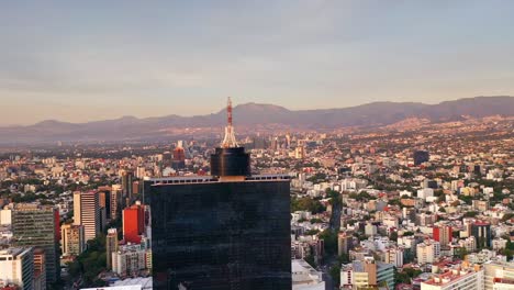 aerial flying world trade center in mexico city cityscape at day