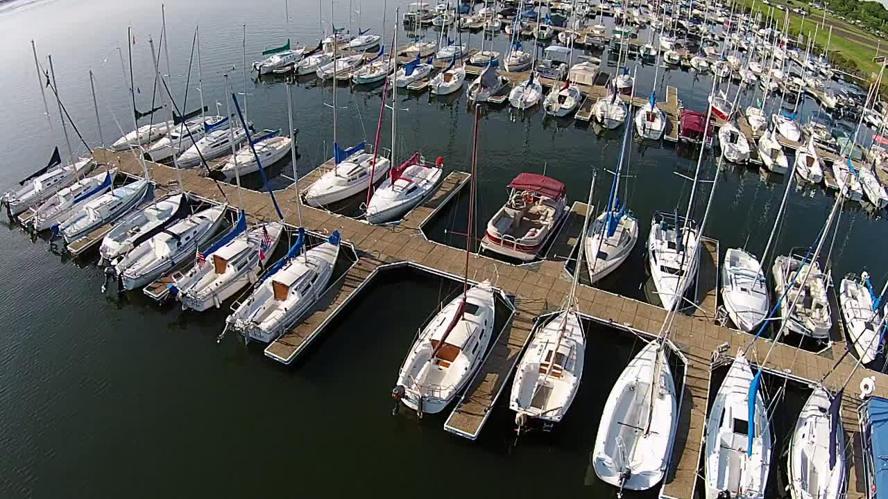Aerial footage of sailboat marina