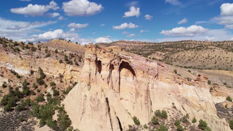 magistic view of grosvenor arch in utah by a drone