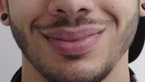 close-up-man-mouth-smiling-happy-facial-hair-style-masculine-beauty-wearing-piercings