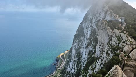 rock of gibraltar with dramatic cloud movement with the atlantic ocean in the background