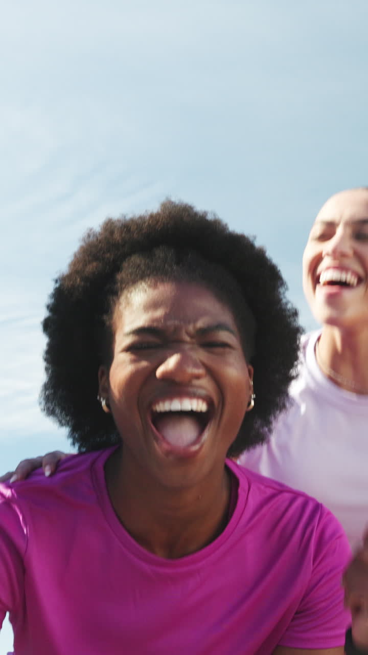 Joyful Diverse Women Laughing Together Outdoors