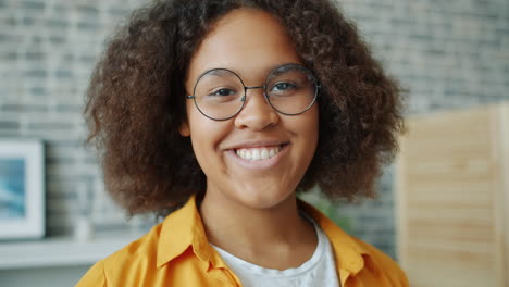 smiling woman wearing glasses