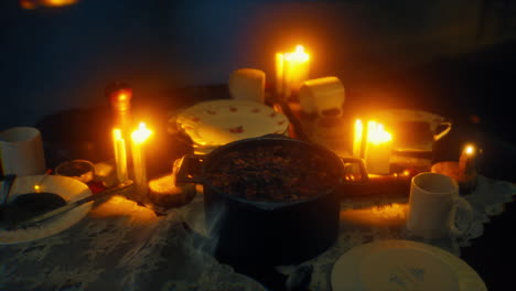 table setting in candlelight at night