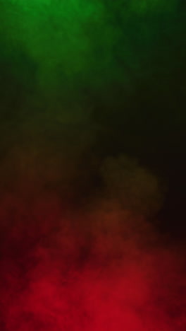 vertical video of white smoke with green and red light moving on black background