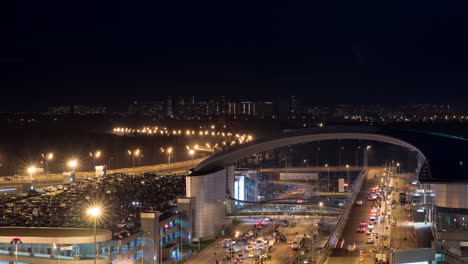 Timelapse-of-busy-car-traffic-in-night-illuminated-city