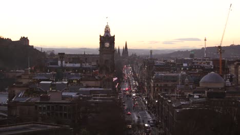 Crazy-bustling-city-of-the-north-showing-Princes-Street-in-Edinburgh-Scotland-United-Kingdom-and-Edinburgh-castle-on-the-mound-from-Calton-hill