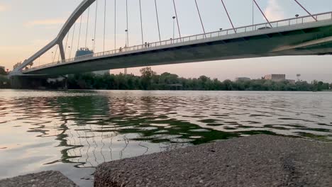 Bus-Crossing-Barqueta-Bridge-at-Sunset-in-Seville