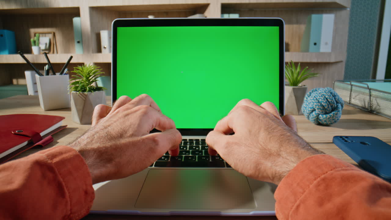 Freelancer searching online mockup laptop at digital office closeup. Man hands
