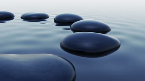 zen stones in water