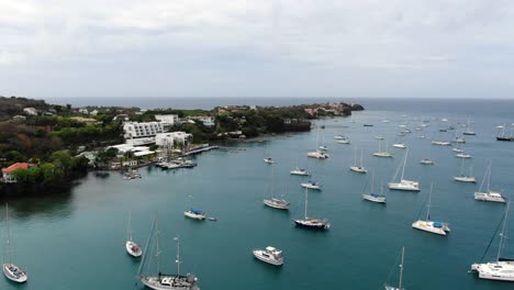 Yachts-anchored-at-prickly-bay-marina-in-grenada,-tranquil-water,-aerial-view