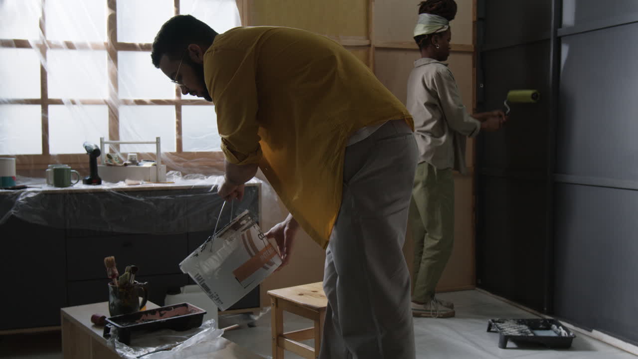 People Painting Room