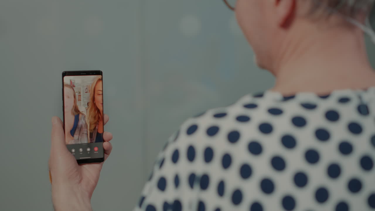 Patient using modern technology to speak with relatives