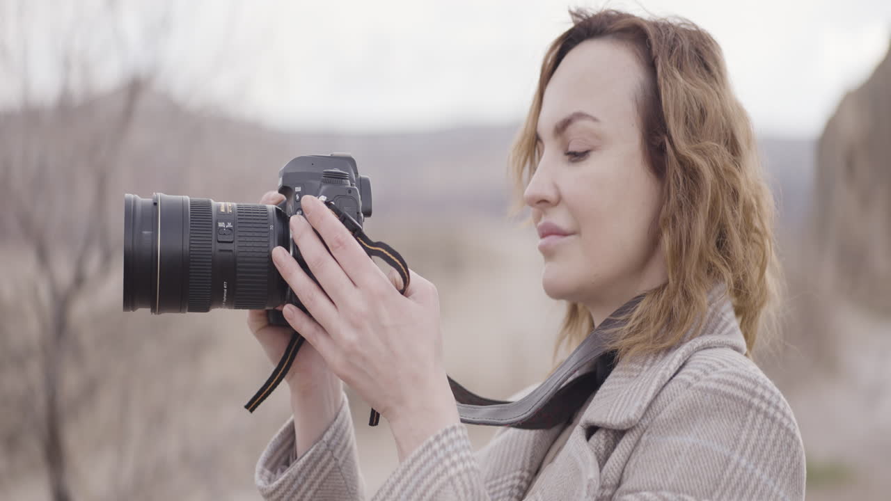 Woman Taking Pictures Outdoors