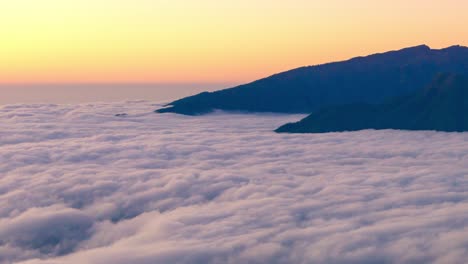 sea of clouds at sunset in la palma island, canary islands