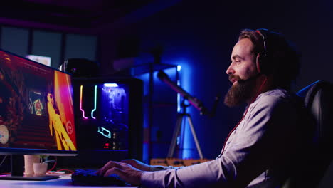 smiling man reaching final mission in coop fps videogame, battling flying robots with online friends