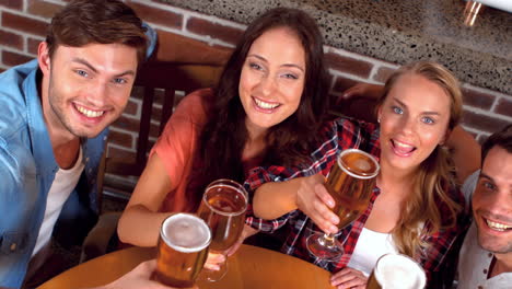 happy friends having a drink together