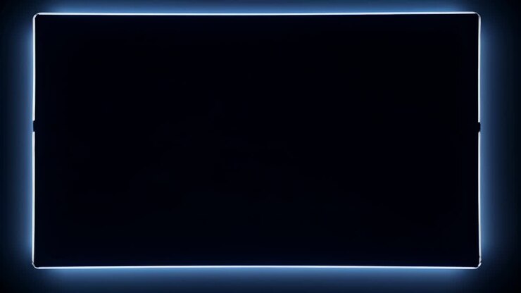 Aerial view of a glowing blue neon rectangle on a dark background, creating a futuristic video