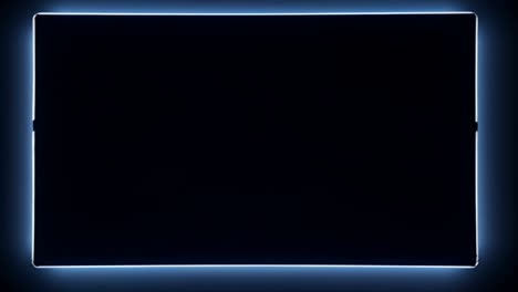 aerial view of a glowing blue neon rectangle on a dark background, creating a futuristic video