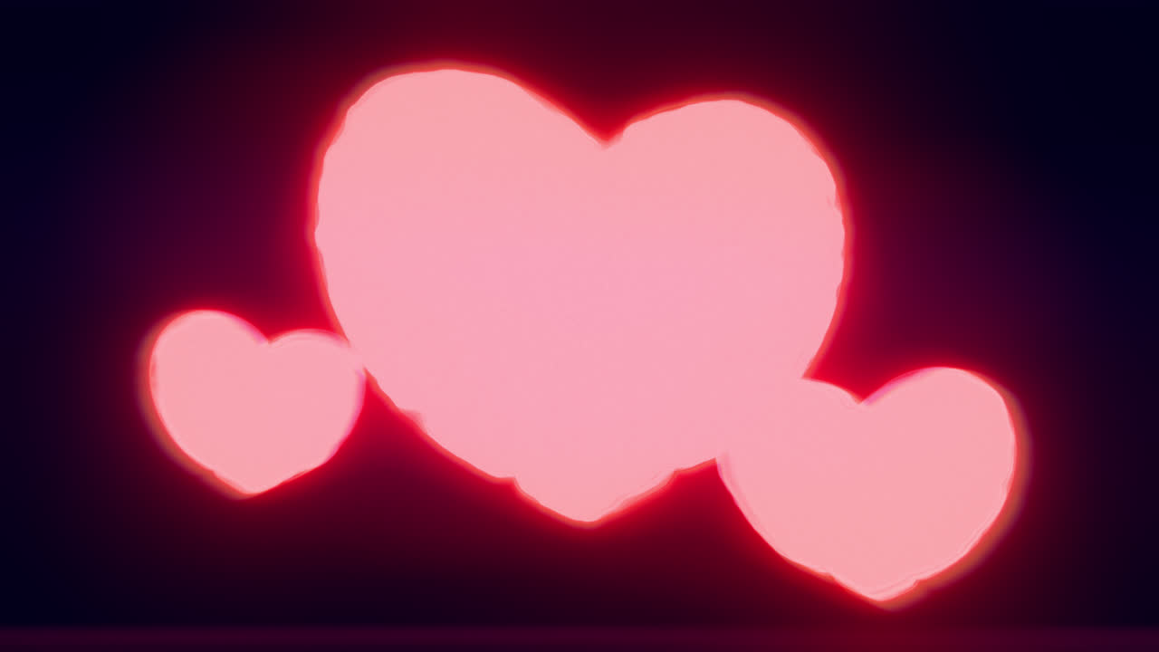 Red energy heart shapes on a dark background