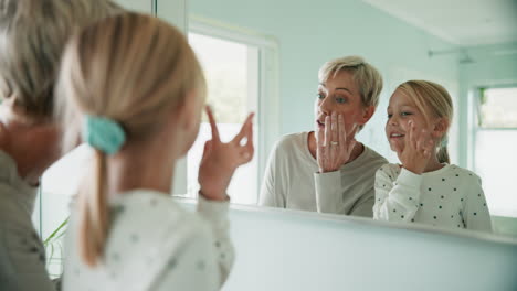 Grandmother,-grandchild-and-mirror