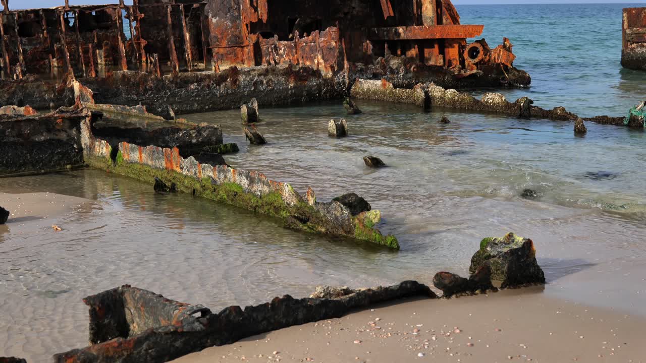 Rusty Remains of an Old Shipwreck on the Beach