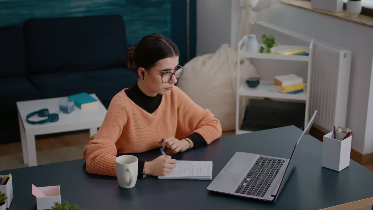 Female student attending online lesson on videoconference