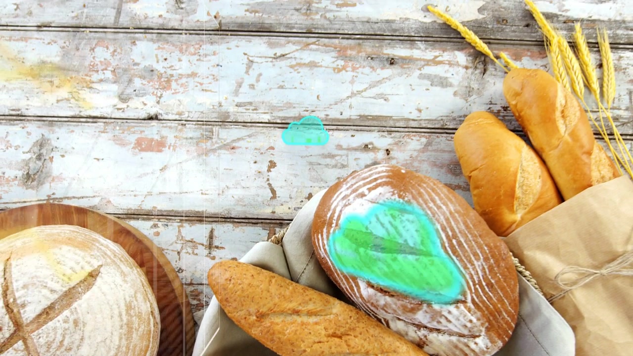 On teal blobs appearing, overlays sweeping across artisanal bread, view rising to highlight rolls