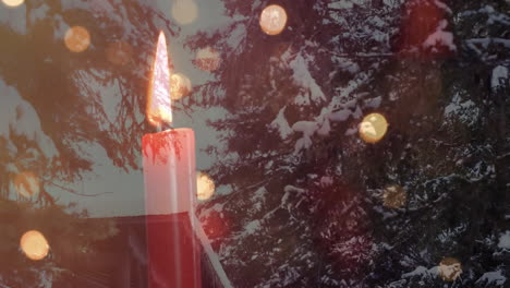 animación de velas, luces de hadas de navidad sobre un paisaje de invierno