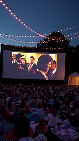 outdoor cinema experience with large audience