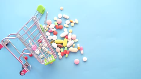 shopping cart filled with assorted pills