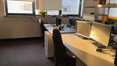 empty corporate office with workstations