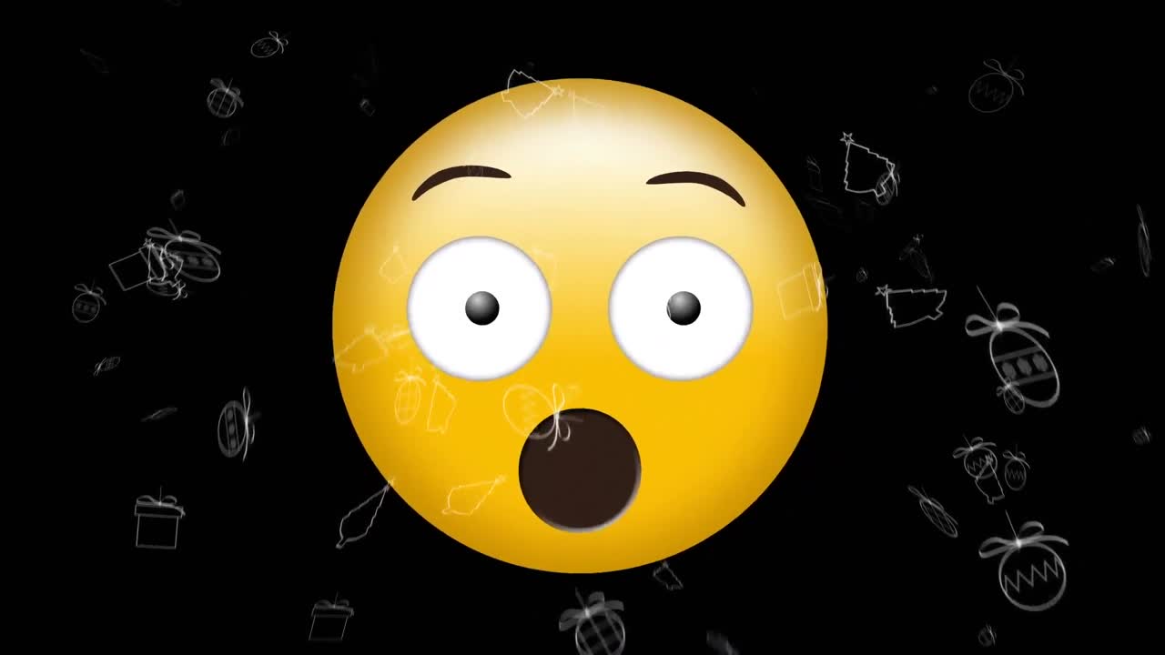 검은 바탕에 떨어지는 크리스마스 트리 위에 무서운 이모지 아이콘의 애니메이션