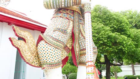 ornate guardian statue at bangkok's wat arun