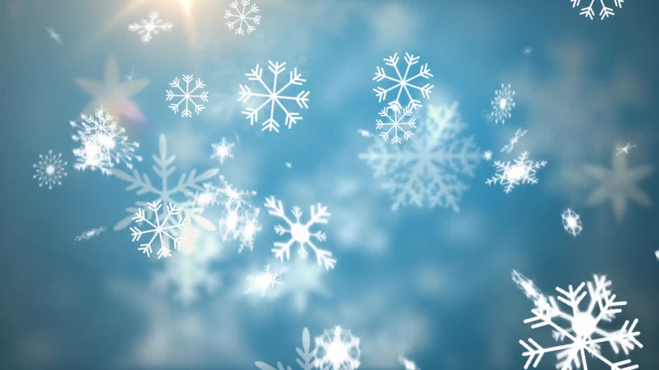 Digital animation of snow flakes falling against bright spot of light on blue background