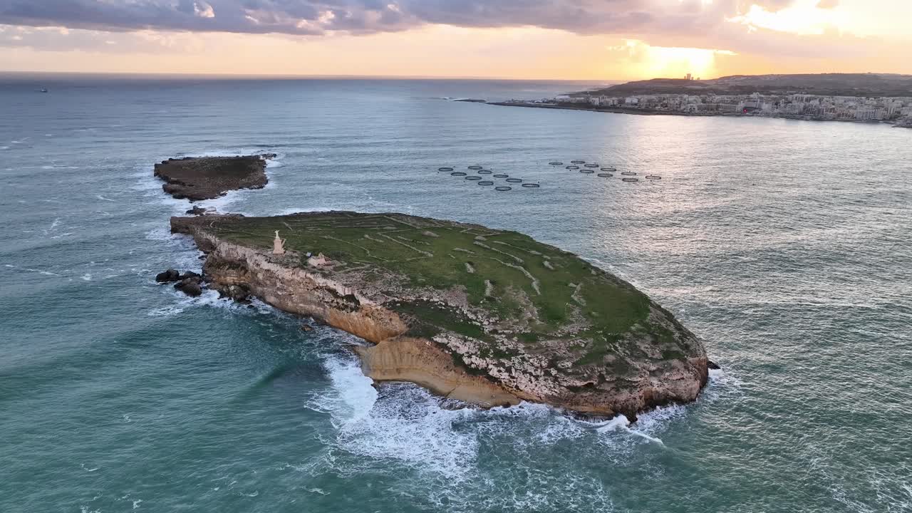 Drone Video Panning Around The Saint Paul's Islands in Malta at Sunrise