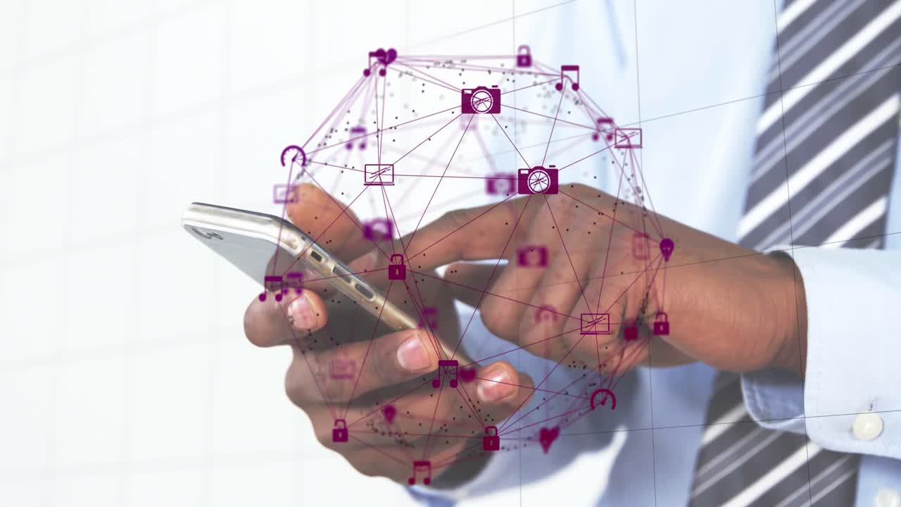 Animation of globe of digital icons spinning over mid section of businessman using smartphone