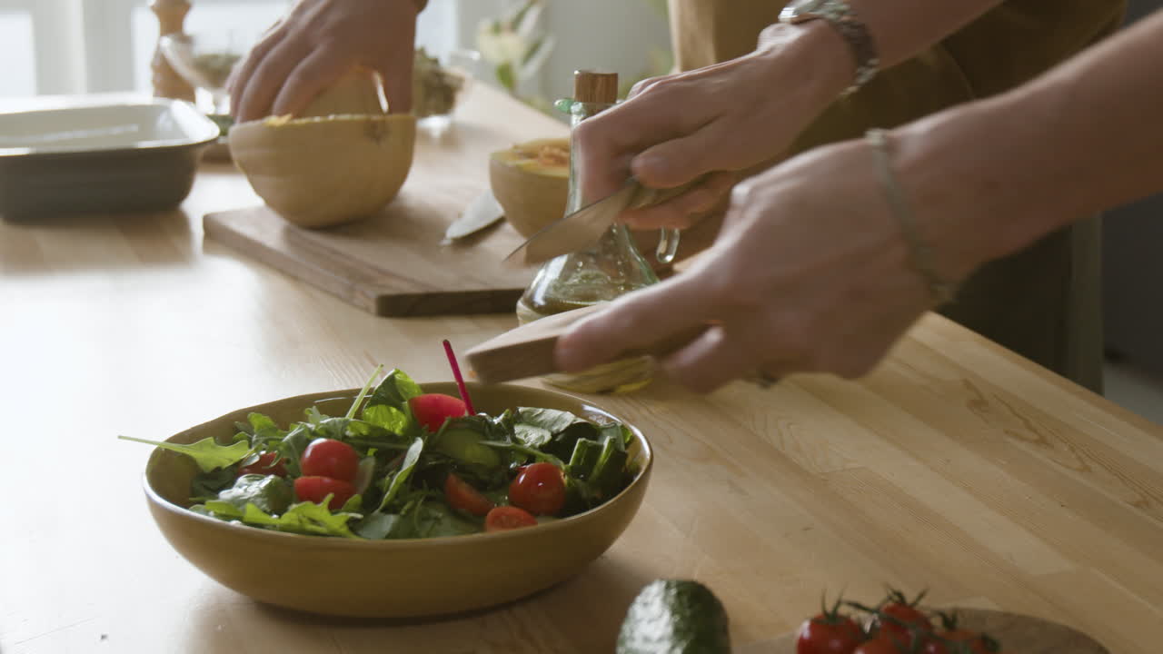 People Preparing Food in the Kitchen