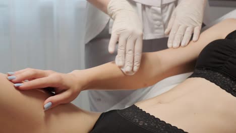 laser epilation - hair removal procedure. flash of diode laser hair removal, beautician removes hair on beautiful female legs, hair removal for smooth skin, laser procedure at beauty studio or clinic, body care epilation treatment.