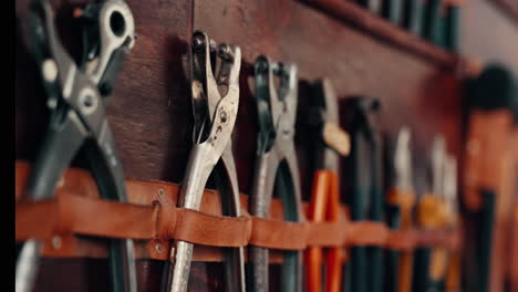 workshop, tools and wall with equipment on shelf