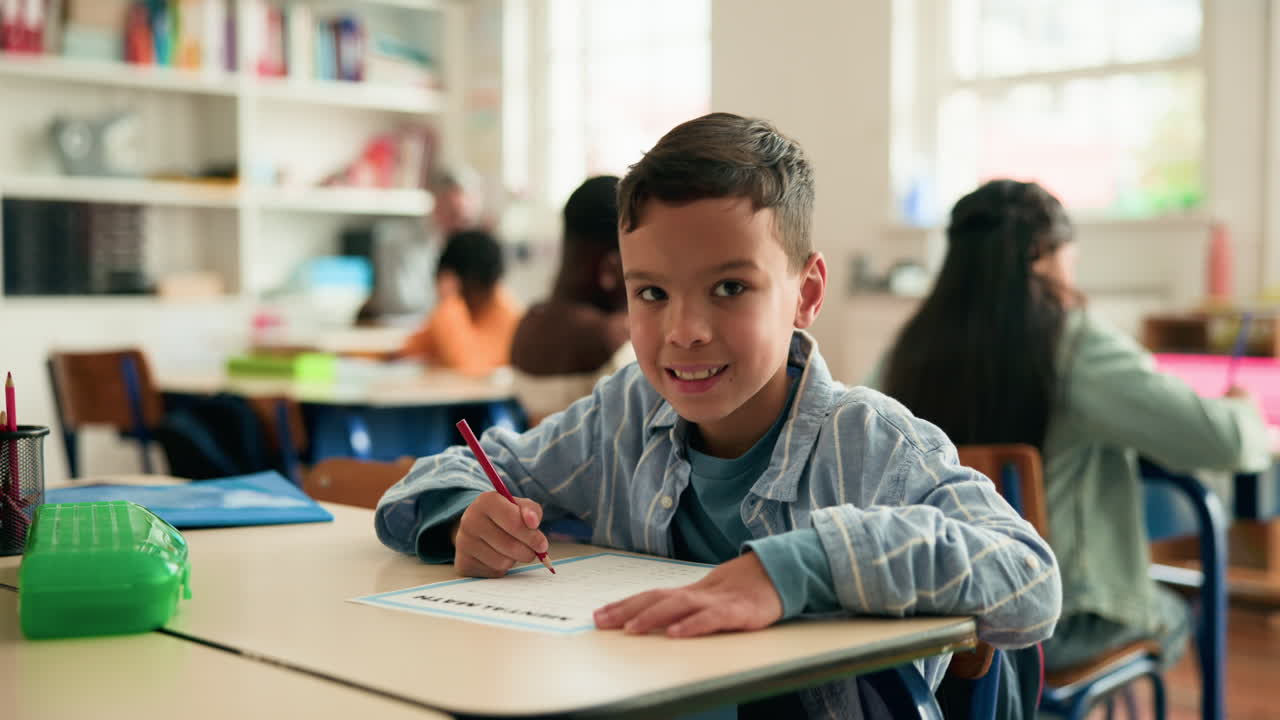 Boy studying in a classroom