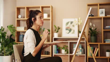 woman painting at home