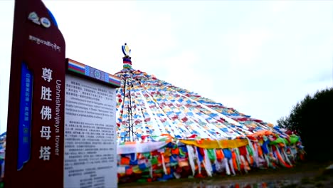 time-lapse-shot-of-tibetan-flags,-pagodas,-temples---religious-structures