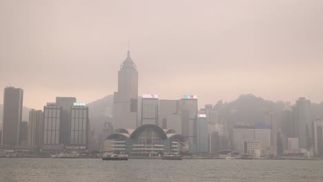 skyline of big cityscape of hong kong at daytime. view from boat