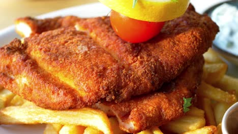 crispy chicken schnitzel with french fries