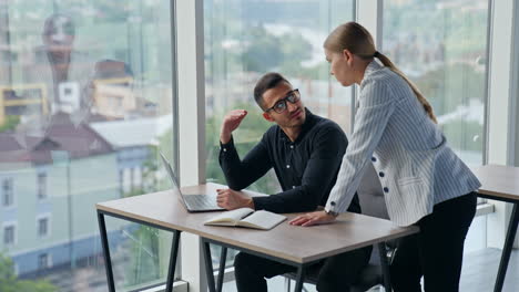 colleagues having trouble in communication solving problems at work. male and female co-workers misunderstanding each other discussing work.