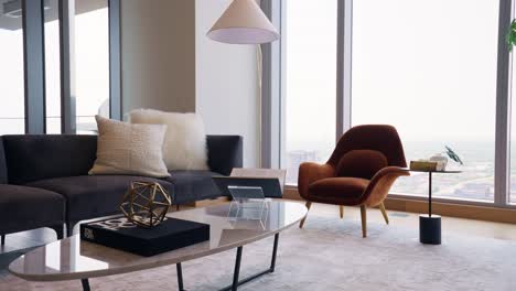 medium tight shot of a uniquely styled modern living room with distinctive furniture in a home