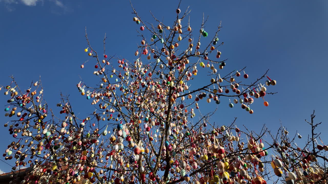 Easter egg tree decorated with colorful ornaments