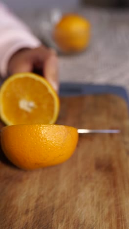 cutting an orange