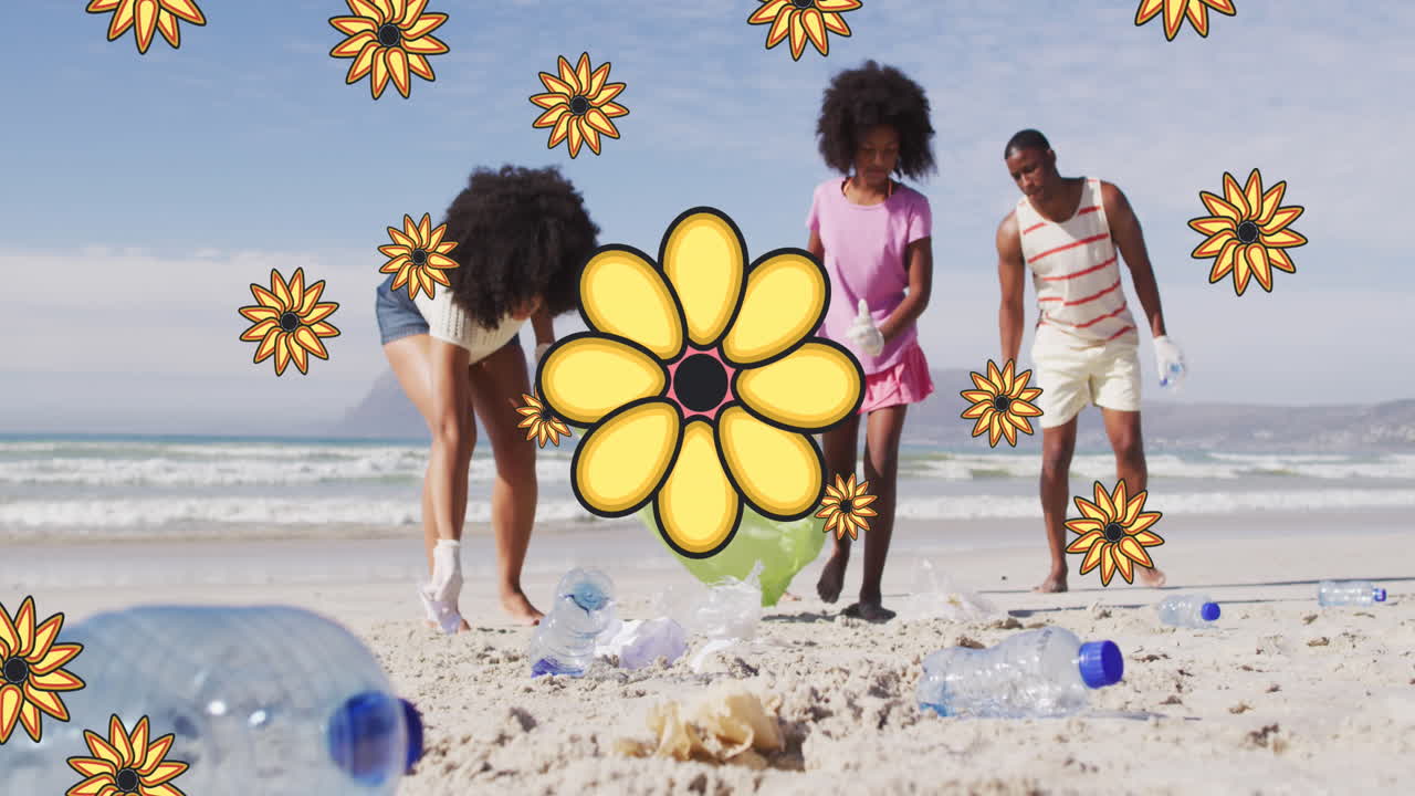 Animation of flowers over african american female and male volunteers picking up rubbish on beach